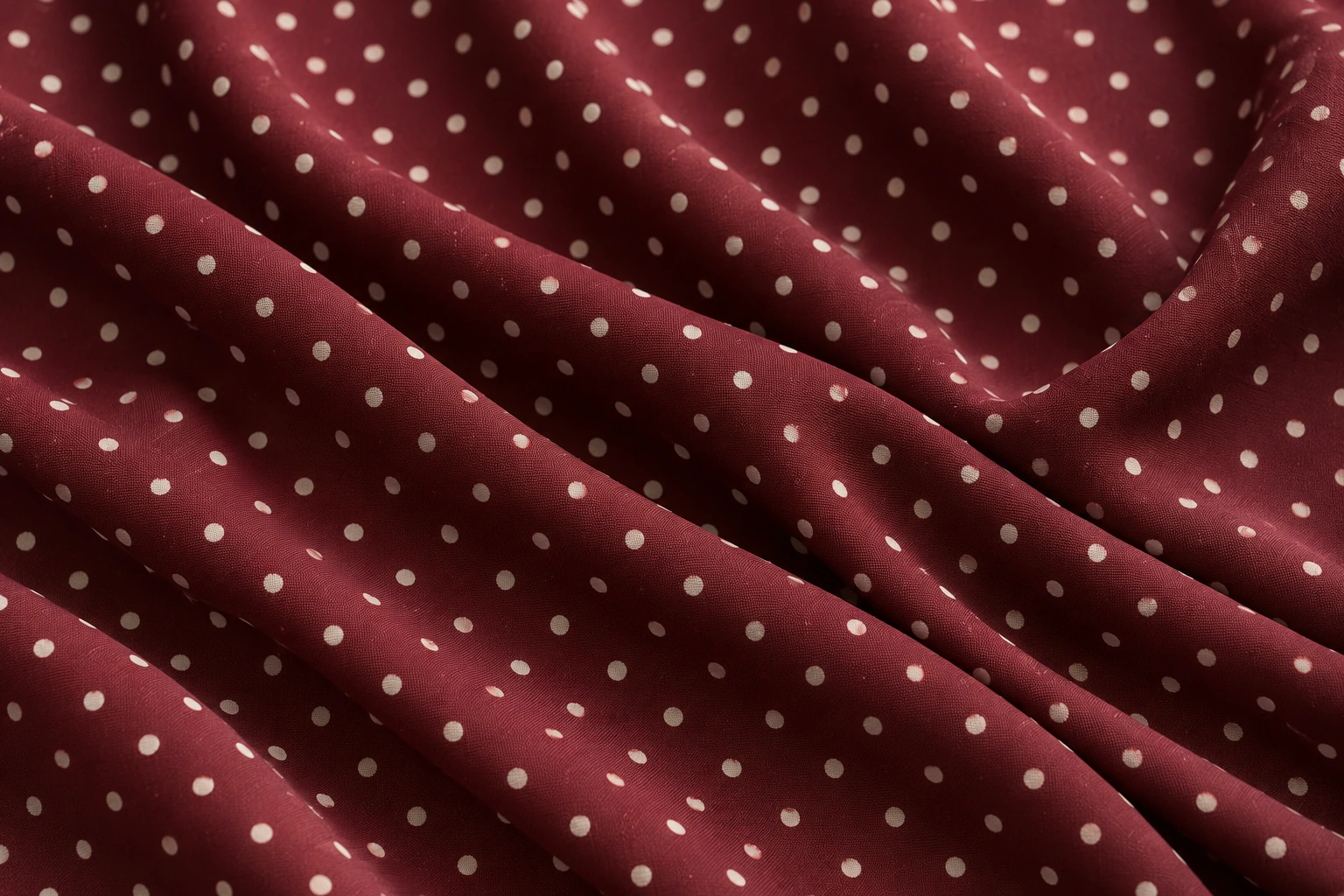 Pois bordeaux: dettaglio illustrativo del tessuto
